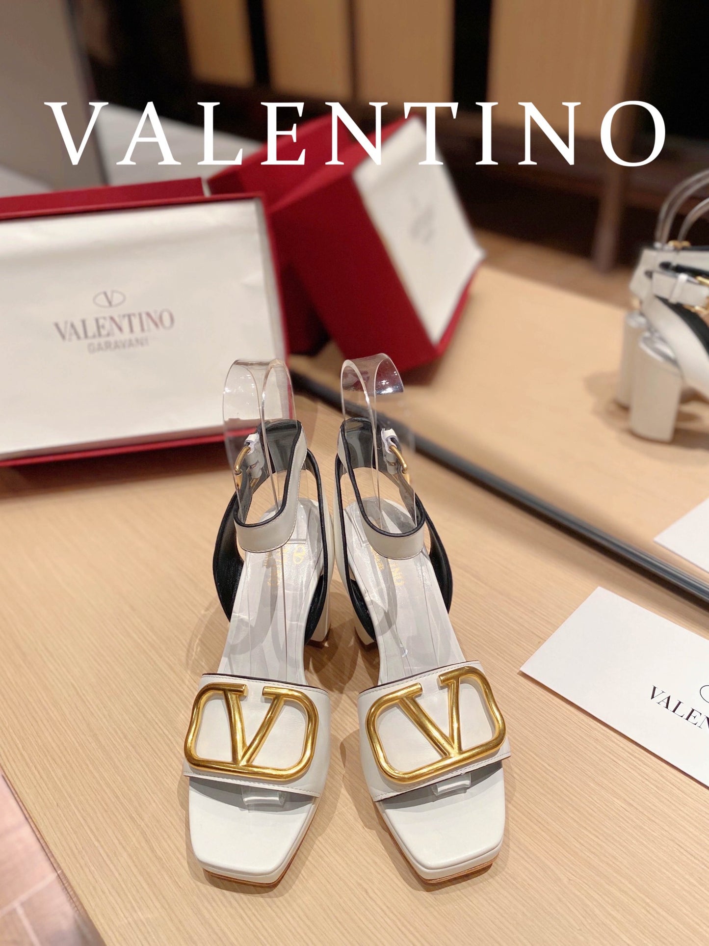 Valentino Garavani Strap Heeled Sandals With V Logo Signature Embellishment White For Women