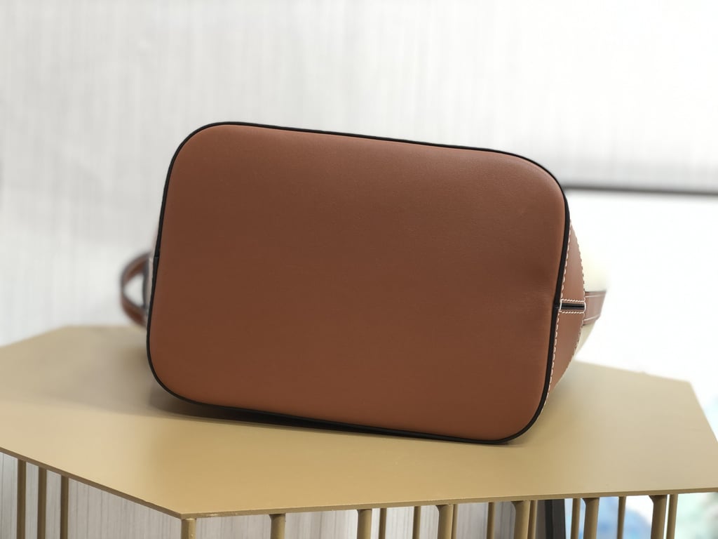 CE CUIR TRIOMPHE IN TEXTILE AND CALFSKIN NATURAL TAN BAG BUCKET