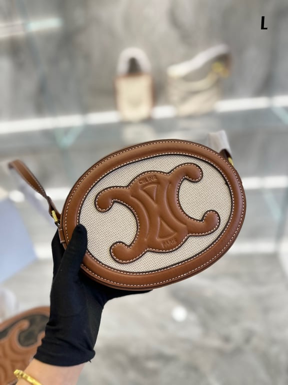CE OVAL BAG CUIR TRIOMPHE IN TEXTILE AND CALFSKIN NATURAL 20CM